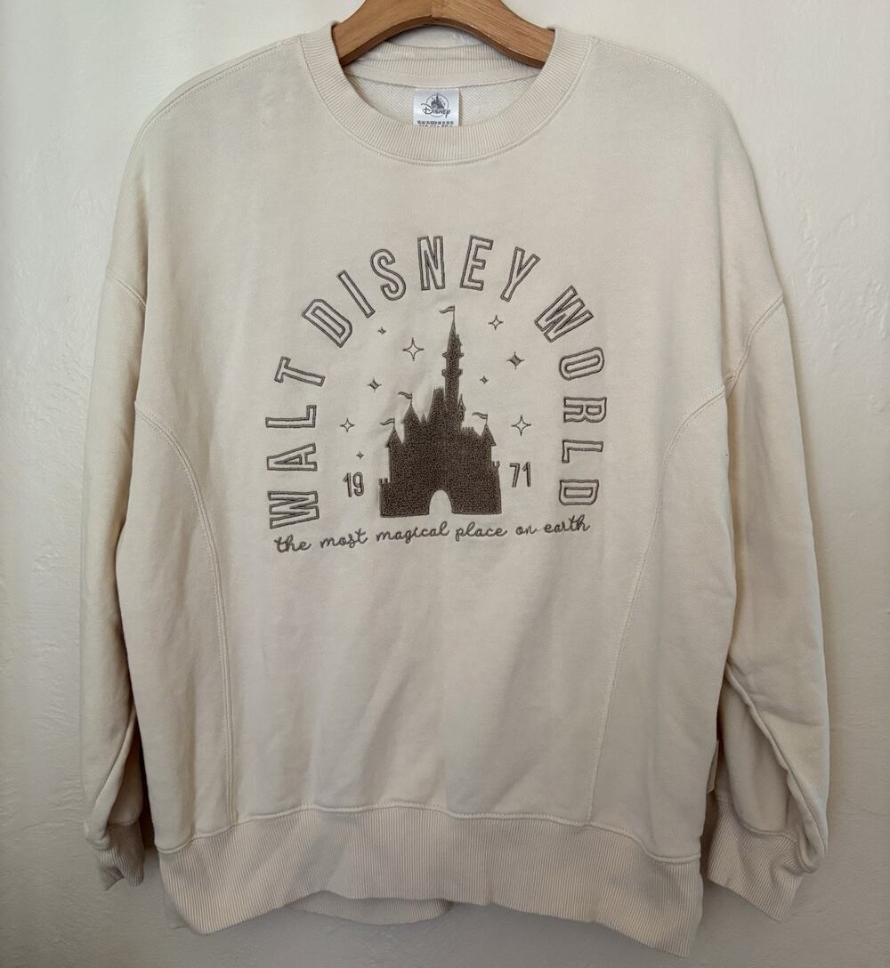 Walt Disney World “The Most Magical Place In Earth” size XS Cream Color